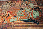Kerala backwaters, Ettunamur the Mahadeva Temple. Painting on the inner walls of the gate show Padmnabha, the form of Vishnu reclining on the serpent  